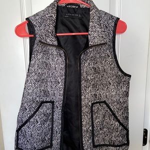 Black and white vest